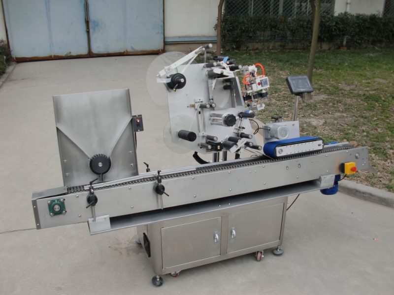 China Conveyor motor H.Y brand vial labeling machine , 7th battery label sticker machine for electronics supplier