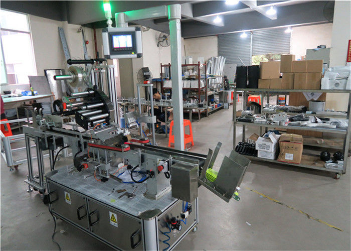 China Auto Top Labeling Machine Flat Surface Label Applicator With Conveyor / Top Labeling Equipment supplier
